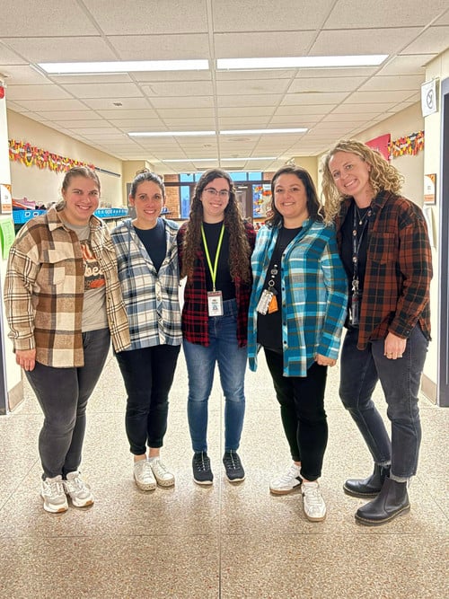 staff wearing plaid shirts