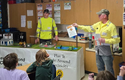 electrical linemen present to students