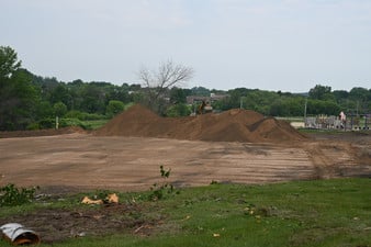 construction dirt piles in Starr parking area