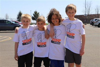 kids with stomp the stigma shirts