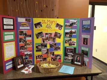 4K informational table filled with flyers and photos