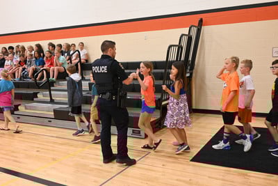 Officer Anderson Greeting Students