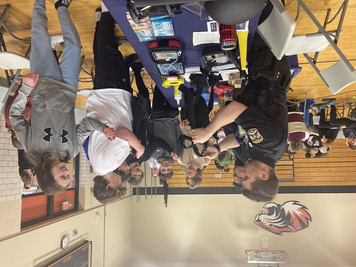 Officer Anderson Teaching Students Using Hands-On Activities