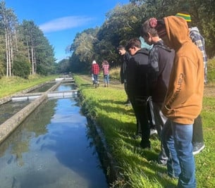 Students at fish hatchery
