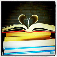 books with pages making a heart shape